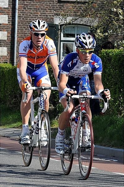 Maxime Vantomme and Lars Boom lead the peloton.