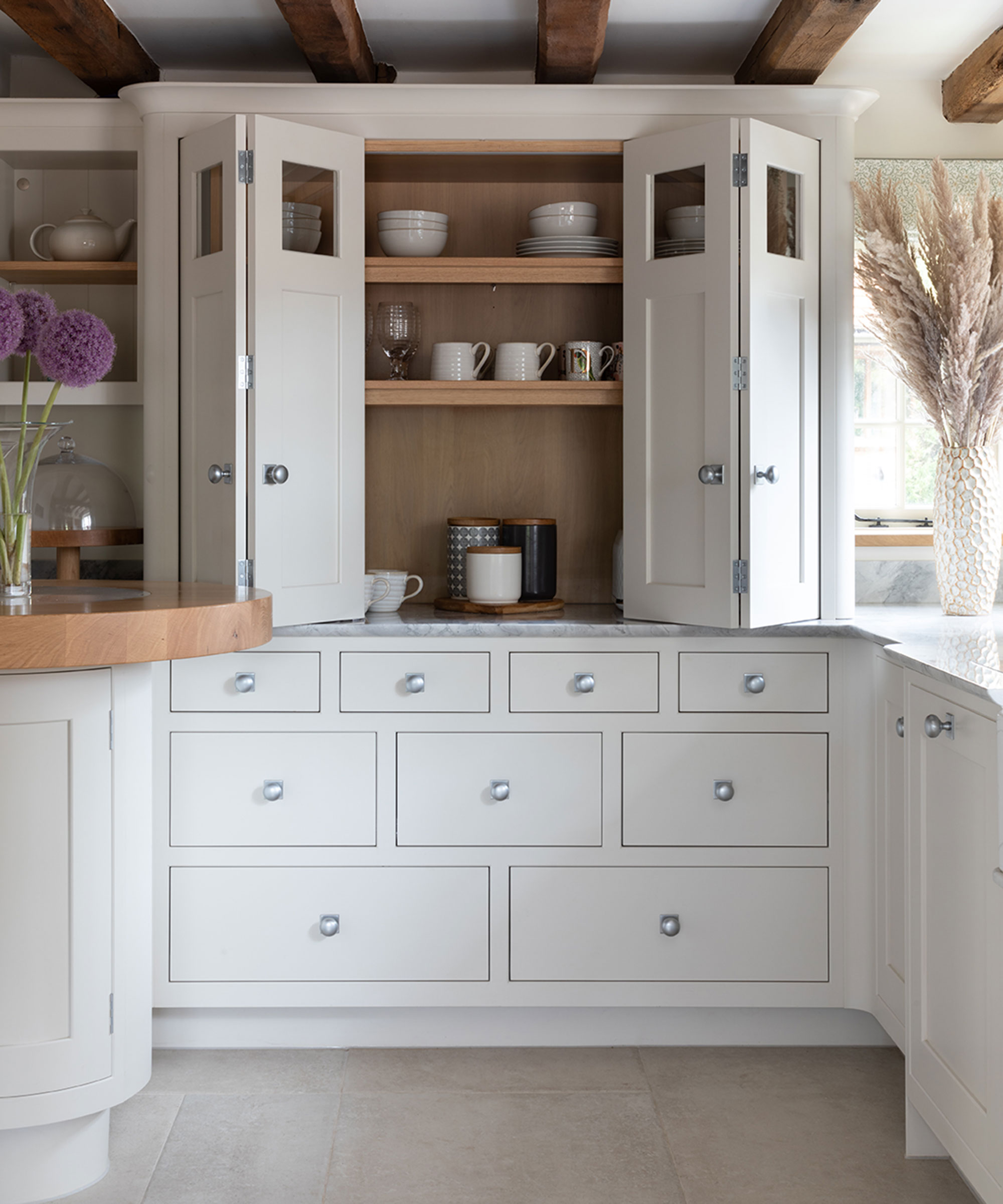 cream shaker kitchen with larder unit