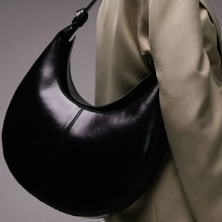 Black leather shoulder bag by Topshop