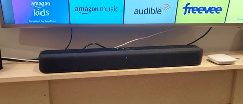 The Amazon Fire TV Soundbar on a shelf.