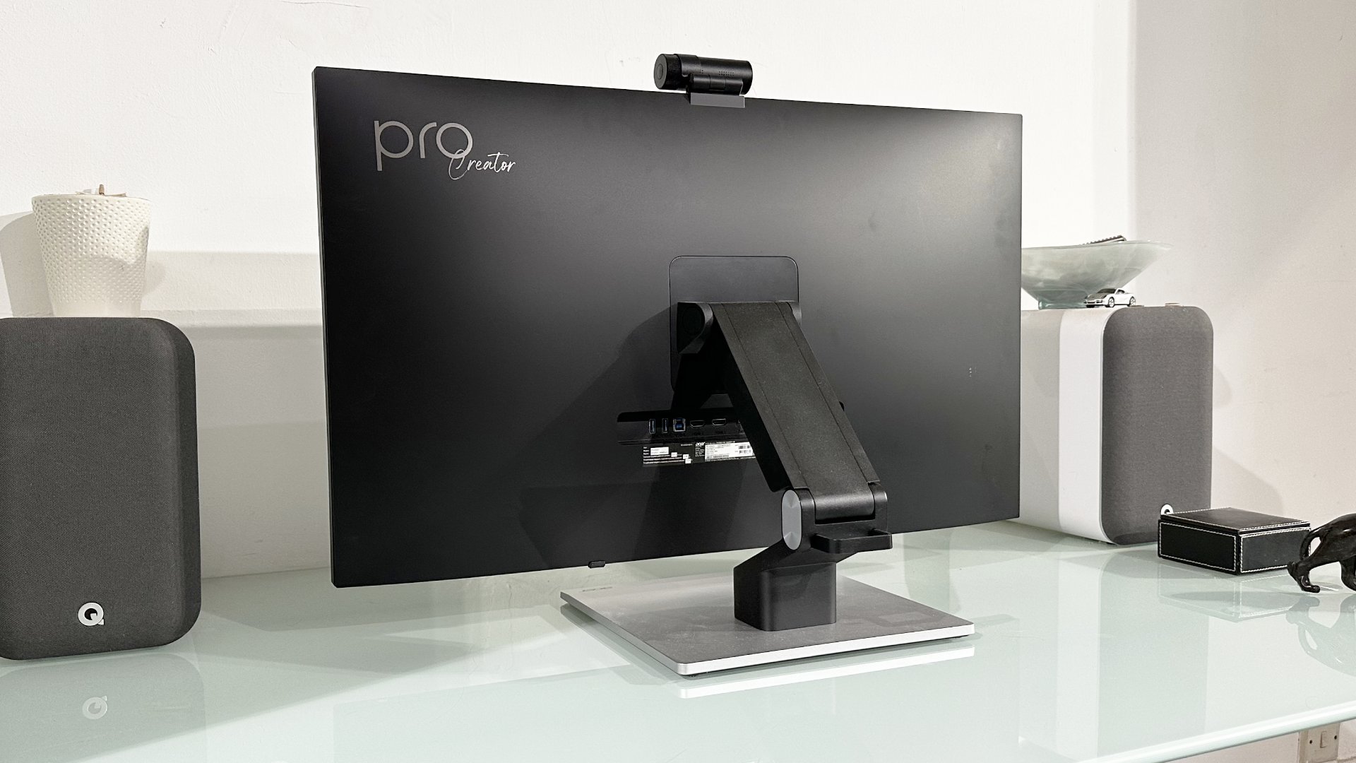 The Acer ProCreator PE320QXT on a desk in a home office during our testing process