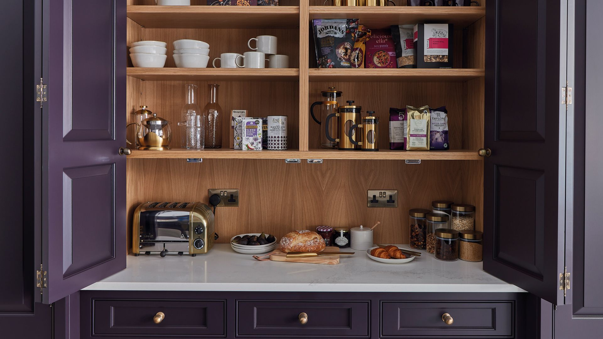 kitchen with pantry cupboard with shelving for food and appliances