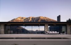 Exterior of linear modernist house in new zealand