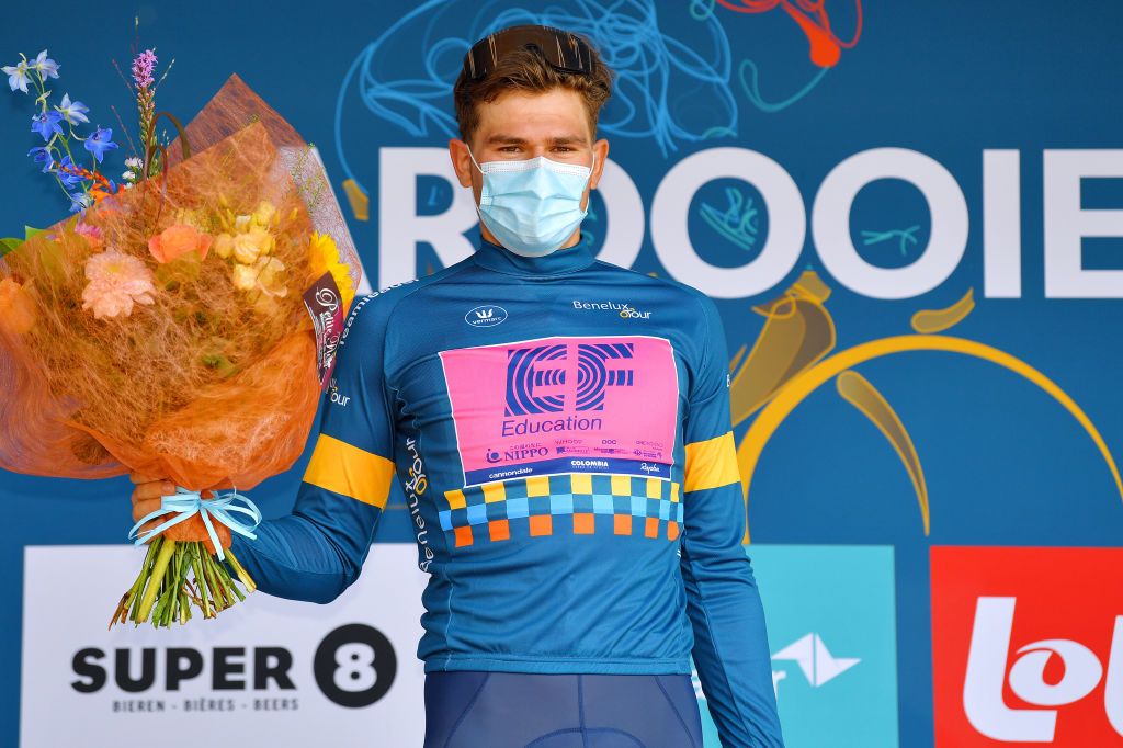 ARDOOIE BELGIUM SEPTEMBER 02 Stefan Bissegger of Switzerland and Team EF Education Nippo celebrates winning the blue leader jersey on the podium ceremony after the 17th Benelux Tour 2021 Stage 4 a 1661km stage from Aalter to Ardooie BeneluxTour on September 02 2021 in Ardooie Belgium Photo by Luc ClaessenGetty Images