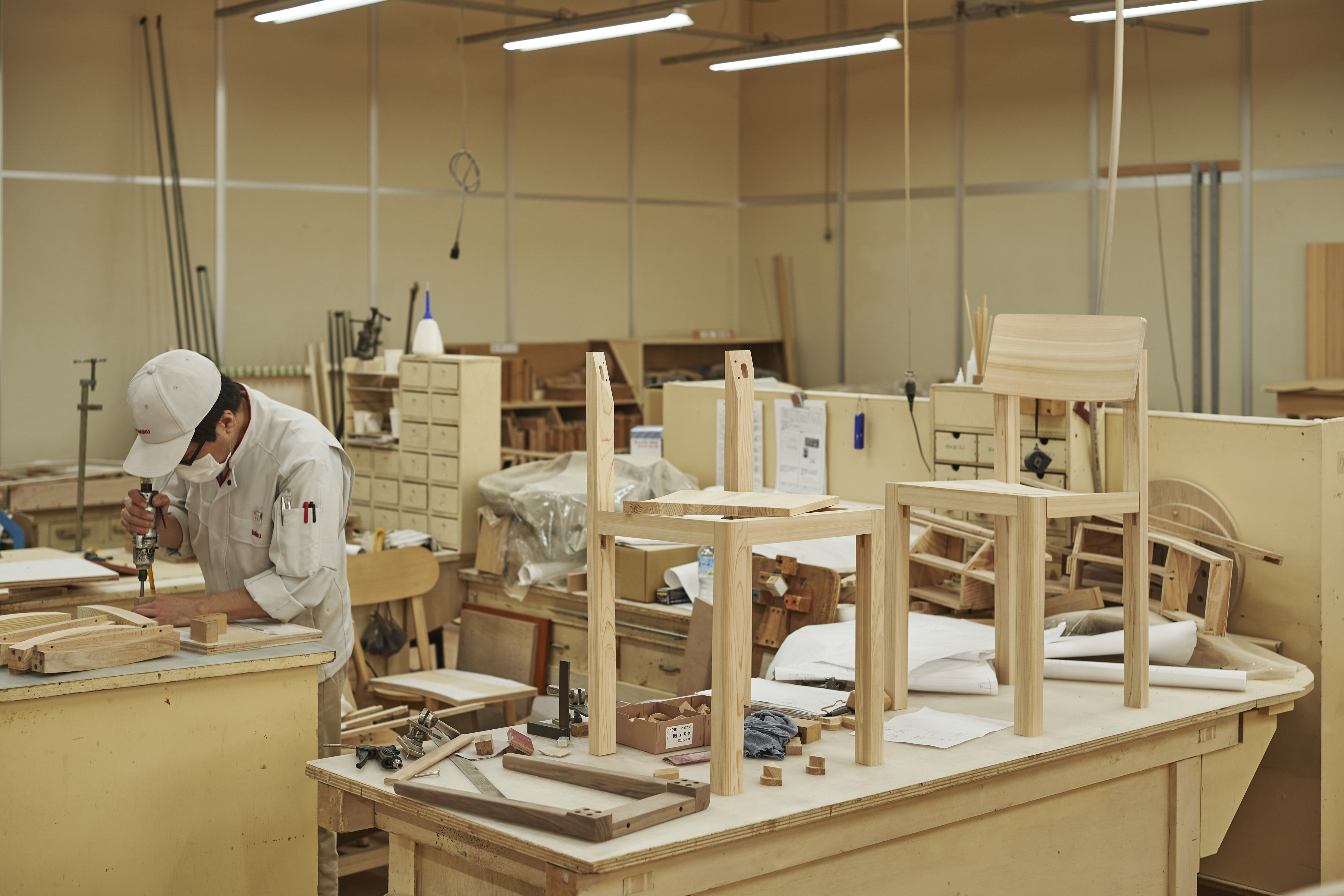 Person at work in the MAS furniture workshop