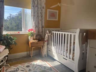 The Obaby Stamford cot bed which was reviewed by our parent tester - pictured in her baby's nursery