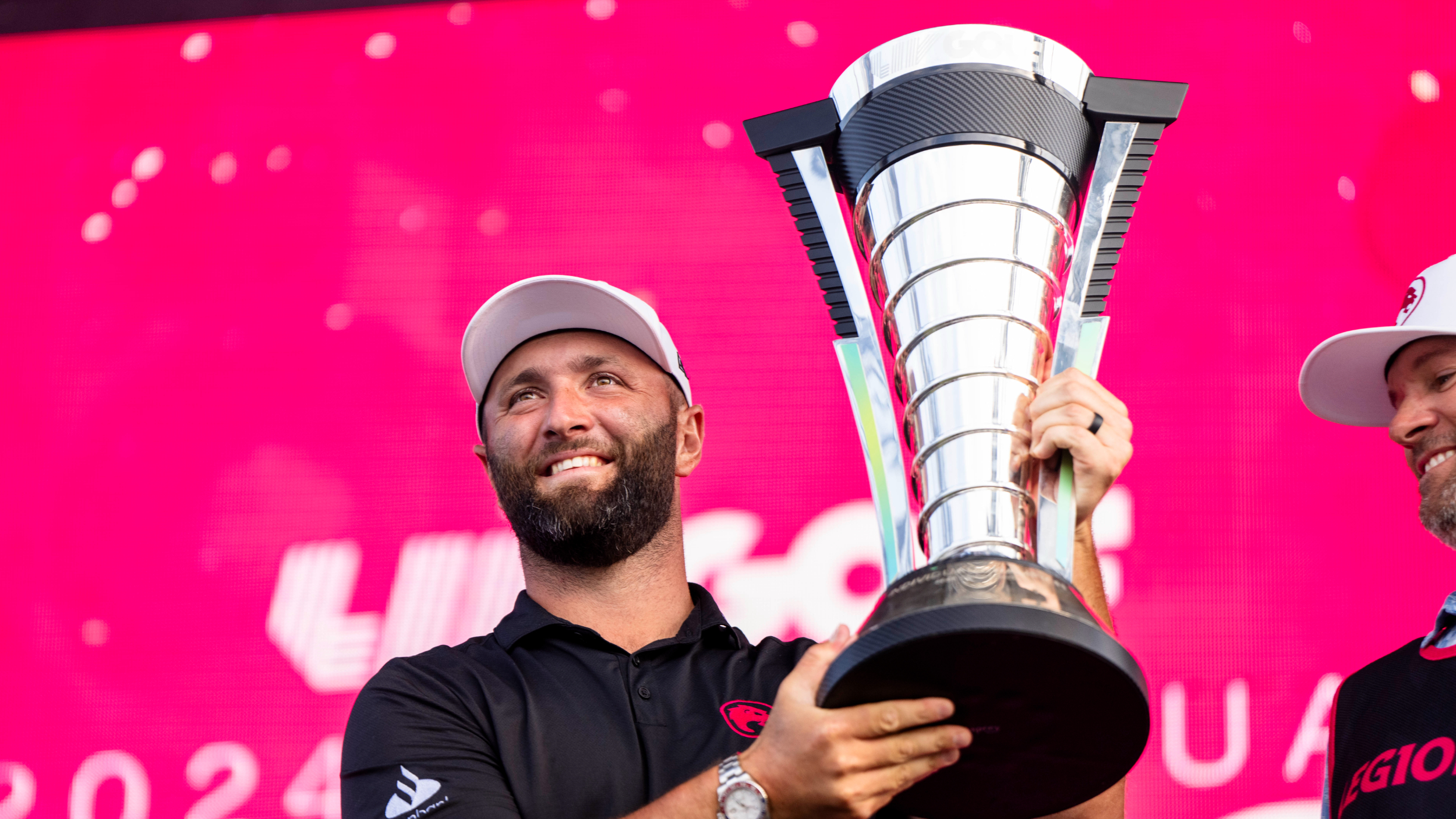 John Rahm with the LIV Golf Individual Championship trophy