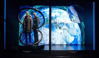 Window display with mannequins encircled by hoops