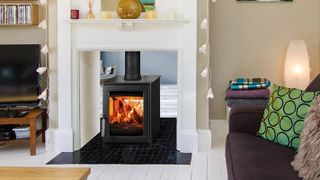 double sided fireplace with log burning stove