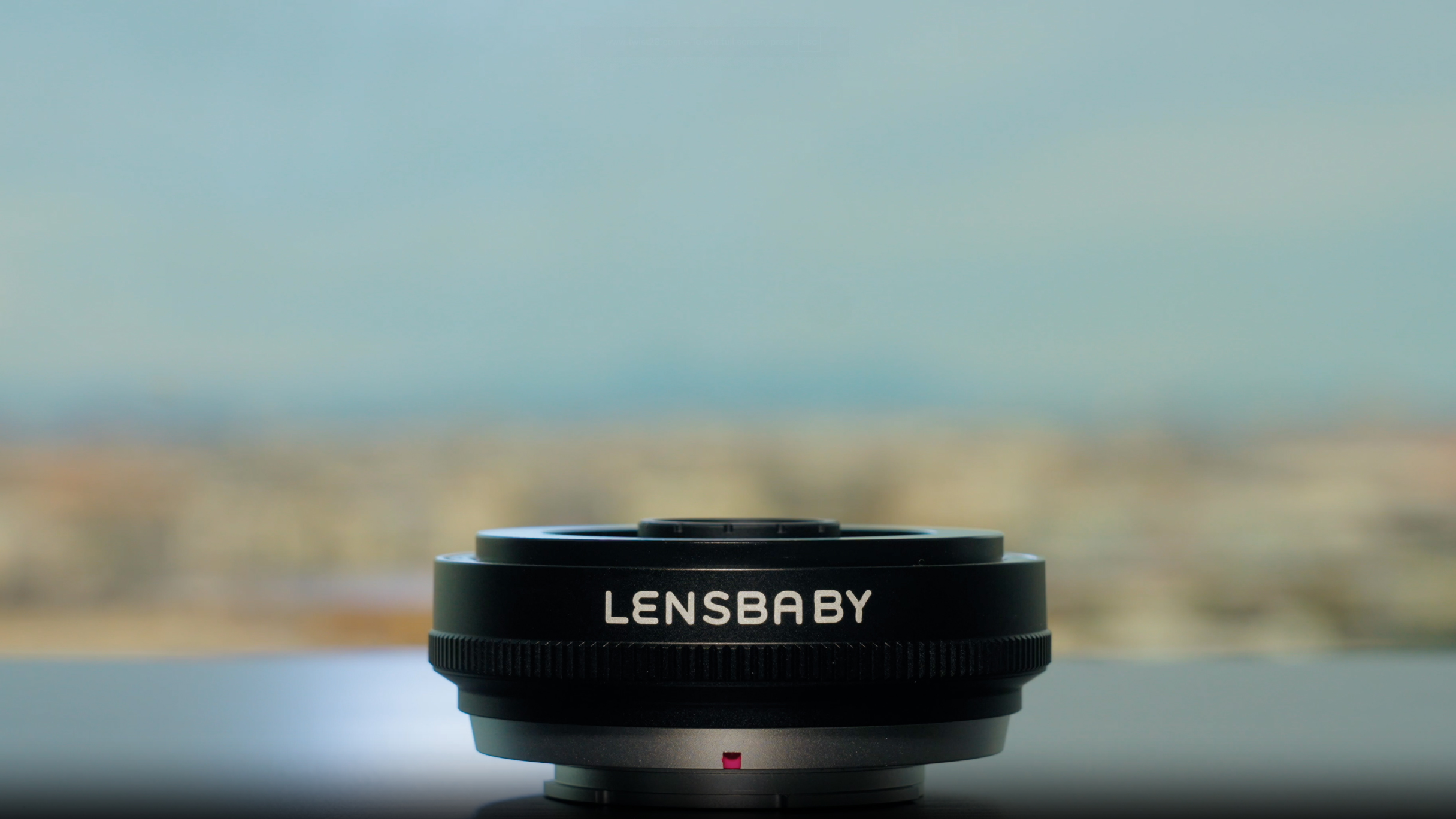 The Lensbaby Twist 28 sitting on a table