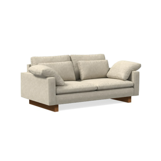 modern beige sofa with wooden frame