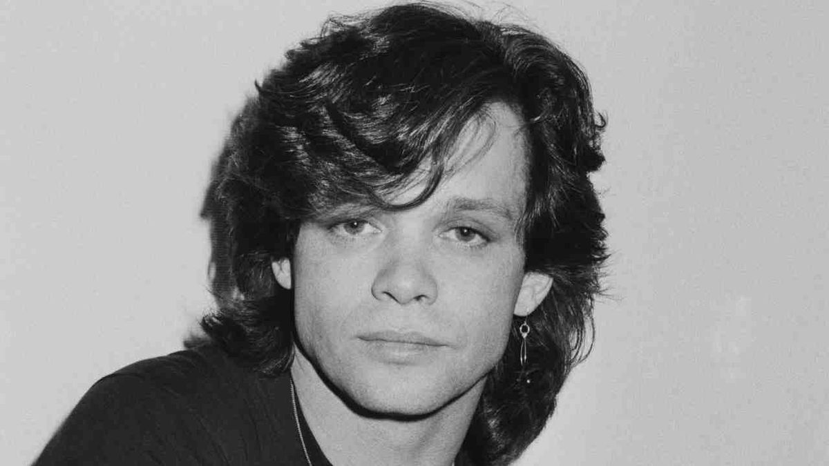 John Mellencamp posing for a photograph in 1980