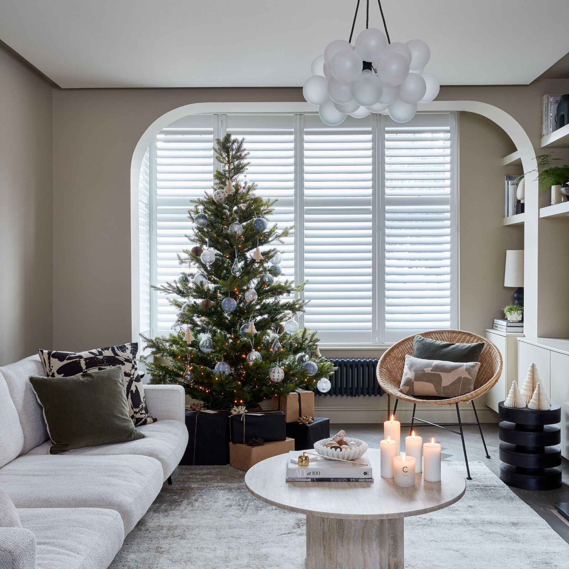 Neutral living room filled with Christmas decorations