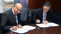 Randhir Thakur, CEO & Managing Director, Tata Electronics (left) and Intel CEO, Lip-Bu Tan (right) sign a contract for semiconductor manufacturing in India