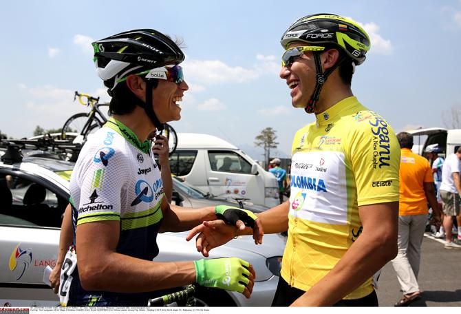Esteban Chavez has a laugh with compatriot Duber Quintero, the race leader