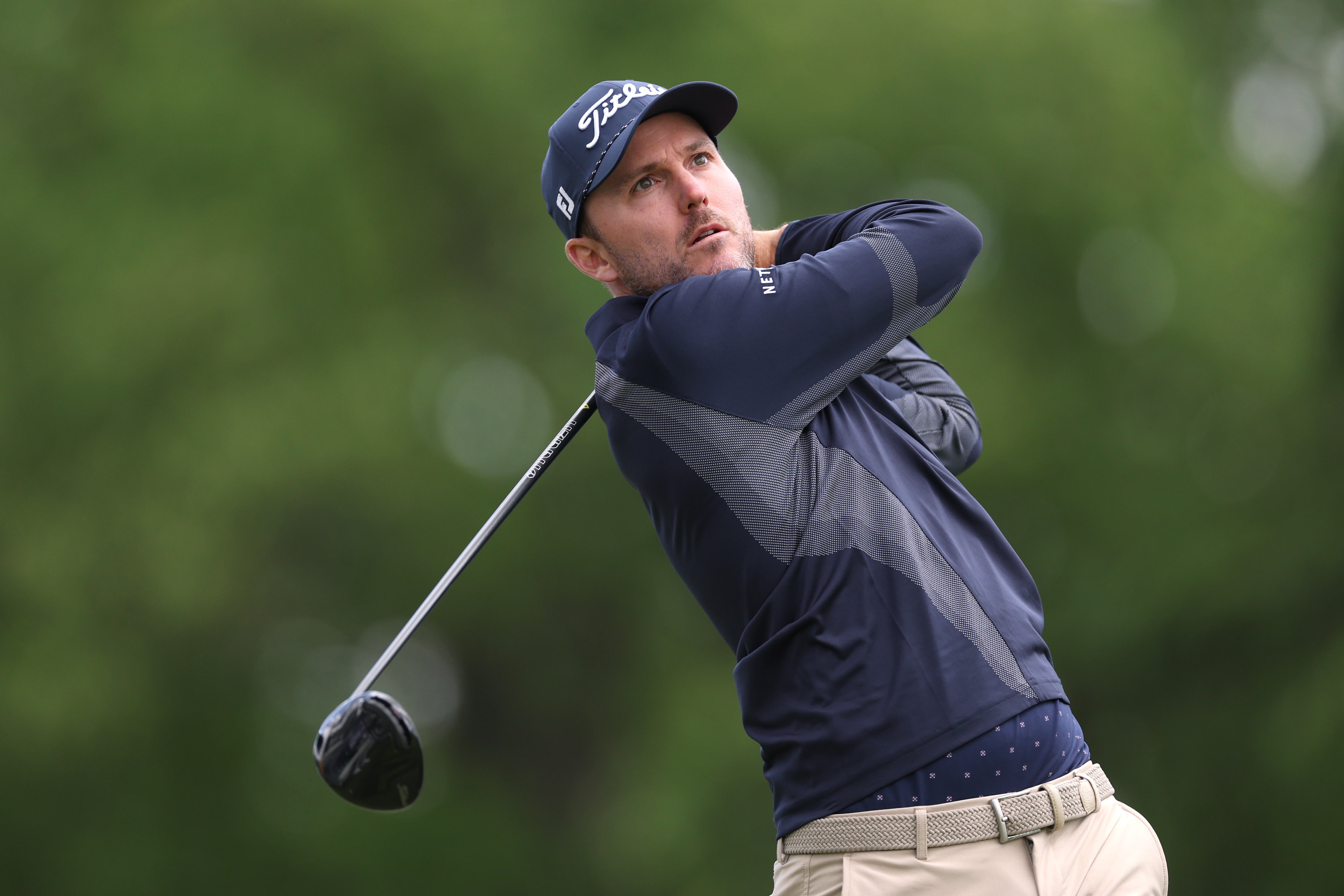 Russell Henley plays his shot from the second tee during the first round of the PGA Championship at Aronimink Golf Club