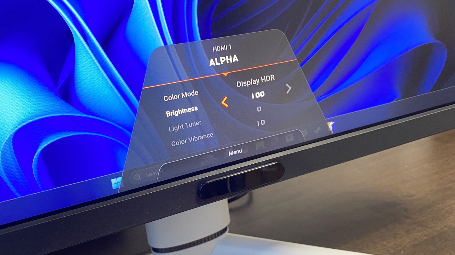 A photo of a BenQ Mobiuz EX321UX gaming monitor's menu options