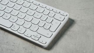 a photograph of the logitech keys-to-go 2 ipad keyboard with scissor-switch keys and 3 bluetooth channels