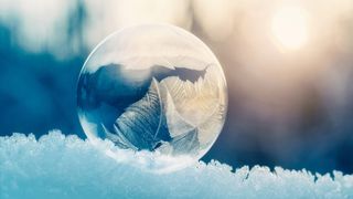 Close-up of frozen bubble in golden light 