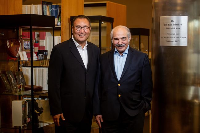 Boras Corp.&rsquo;s Tad Yo (l.) with the University of Denver&rsquo;s Ron Rizzuto at the Cable Hall of Fame screening in Denver.