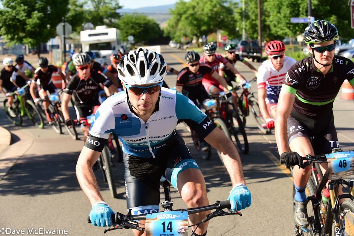 Bryan Alders (TrainingPeaks) on the front of the controlled start