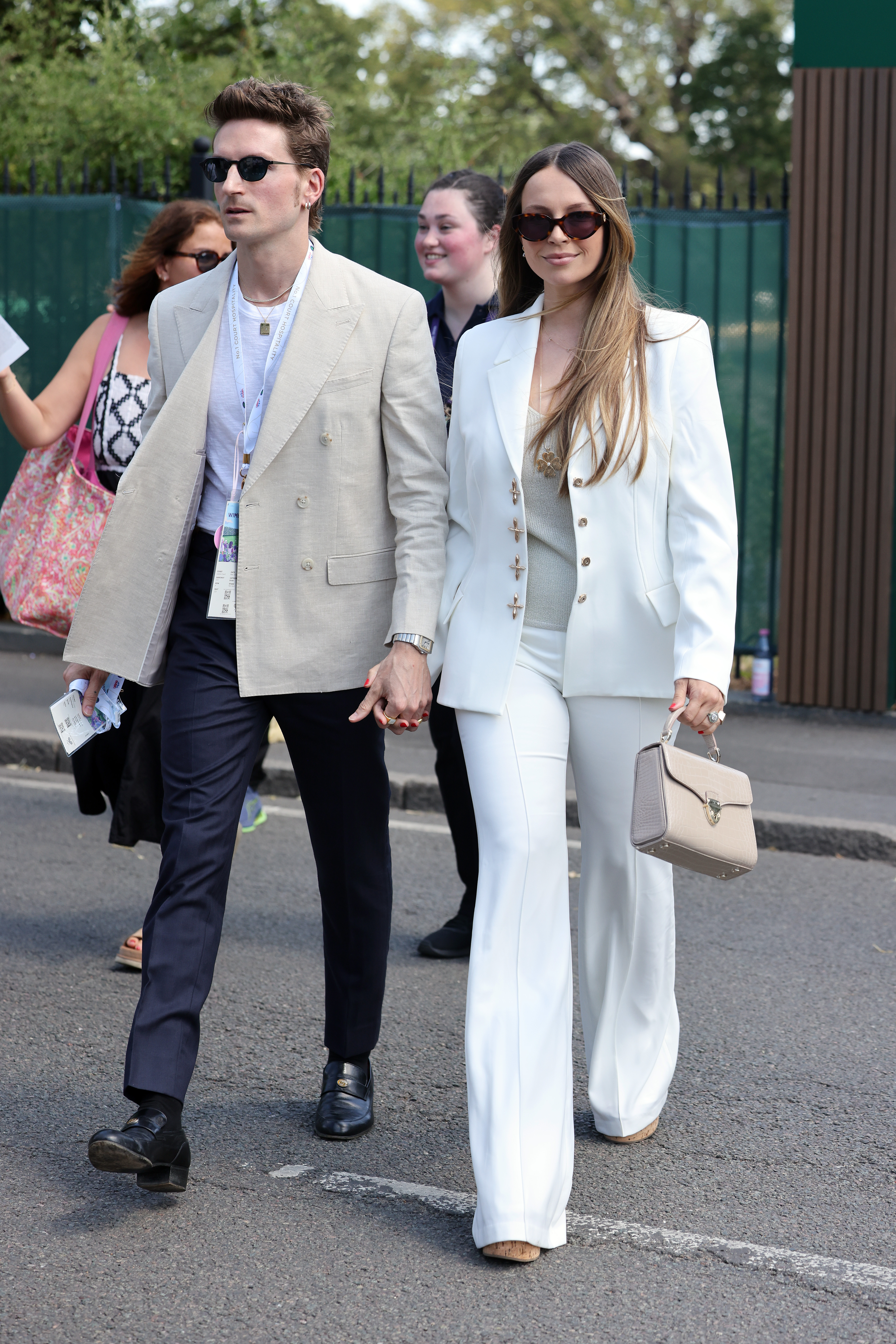 Oliver Proudlock and Emma Louise Connolly attend day one of the Wimbledon Tennis Championships