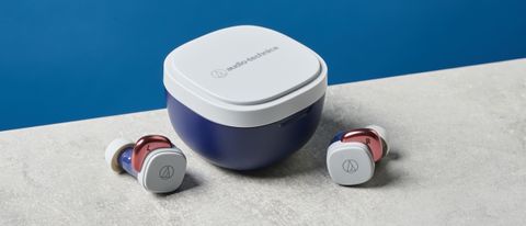 A pair of Audio-Technica ATH-SQ1TW wireless earbuds, both sitting next to their closed case