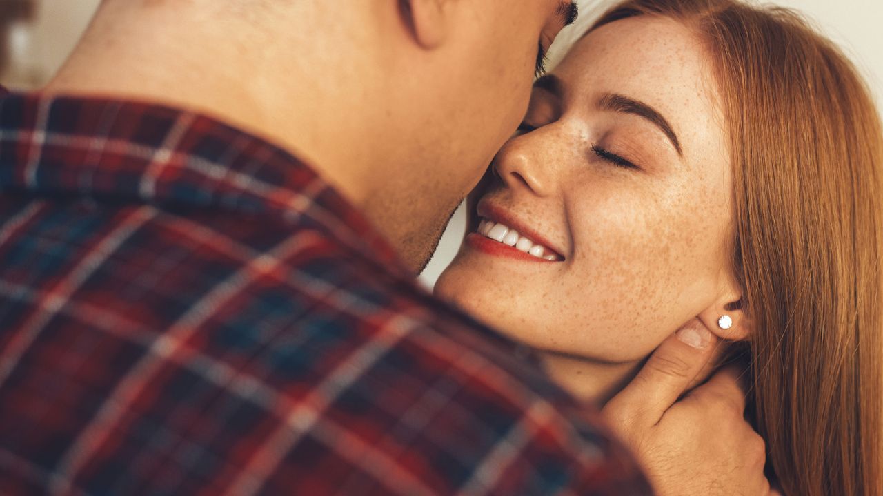 Man and a woman kissing