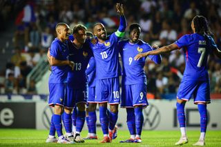 France 2024 Olympics squad rench forward #10 ALexandre LAcazette (3L) celebrates with his teammates after scoring his team's fifth goal during the U23 friendly football match between France and Dominican Republic at Mayol Stadium in Toulon, south-eastern France, on July 11, 2024, in preparation for the Paris 2024 Olympic Games. (Photo by CLEMENT MAHOUDEAU / AFP) (Photo by CLEMENT MAHOUDEAU/AFP via Getty Images)