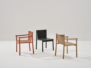 Milan Design Week Arper Kata chairs in wood and black, tan and red fabric