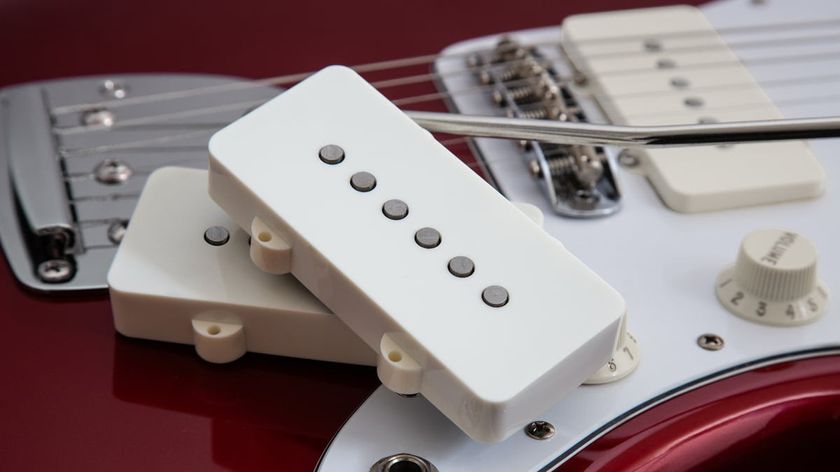 Seymour Duncan Silencer Jazzmaster pickups sit on top of a candy apple red Jazzmaster