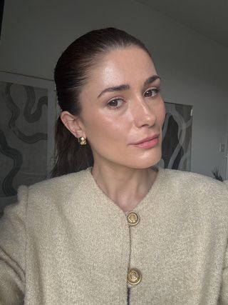 An image of Who What Wear Beauty Editor, Eleanor Vousden wearing Dior Rosy Blush, one of the best blushers.