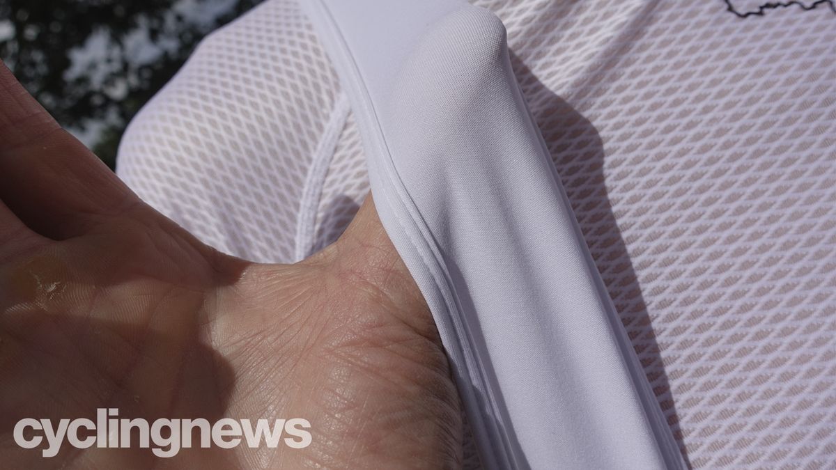 Close up of the bib strap on Rapha Core Cargo bib shorts