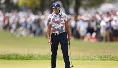 Rickie Fowler eyes up his birdie putt