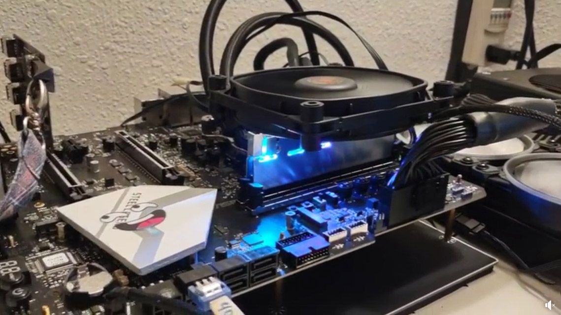 An overclocker acheived almost DDR5-8000 with ASRock’s Z690 Aqua OC Motherboard and Teamgroup memory