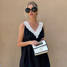 Elsa Hosk wearing a mini summer dress with flip-flops.