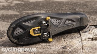The sole of a Specialized S-Works Vent shoe with Shimano SPD SL cleat fitted