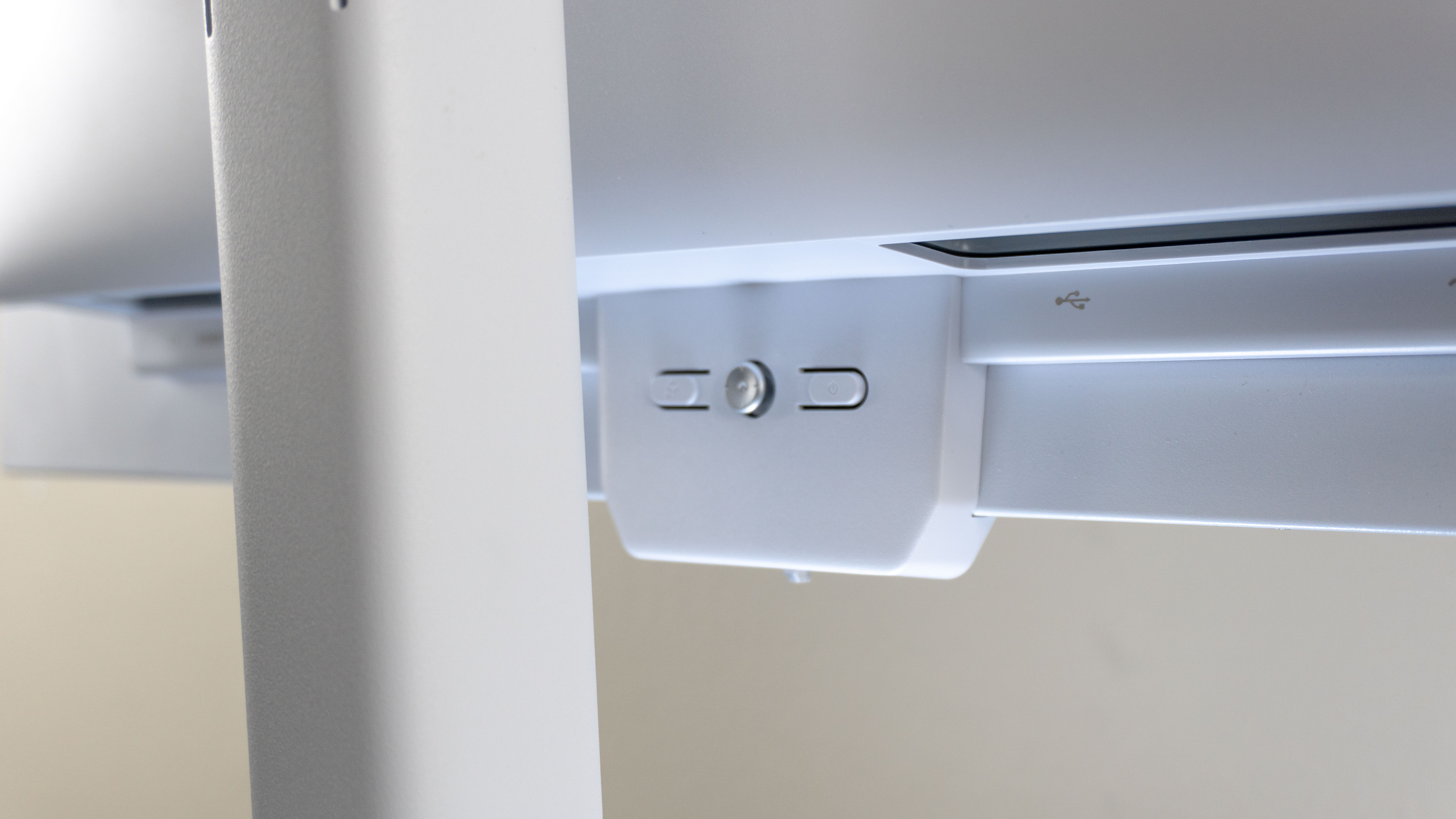 A closeup shot of the joystick and buttons on the backside of the MSI Pro Max 271UPXW12G monitor's AI Care Sensor