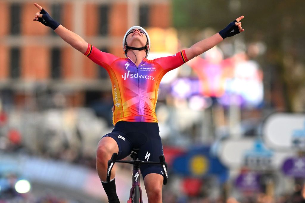 NINOVE BELGIUM FEBRUARY 25 Lotte Kopecky of Belgium and Team SD Worx celebrates at finish line as race winner during the 18th Omloop Het Nieuwsblad Elite 2023 Womens Elite a 1322km one day race from Ghent to Ninove OHN23 on February 25 2023 in Ghent Belgium Photo by Luc ClaessenGetty Images