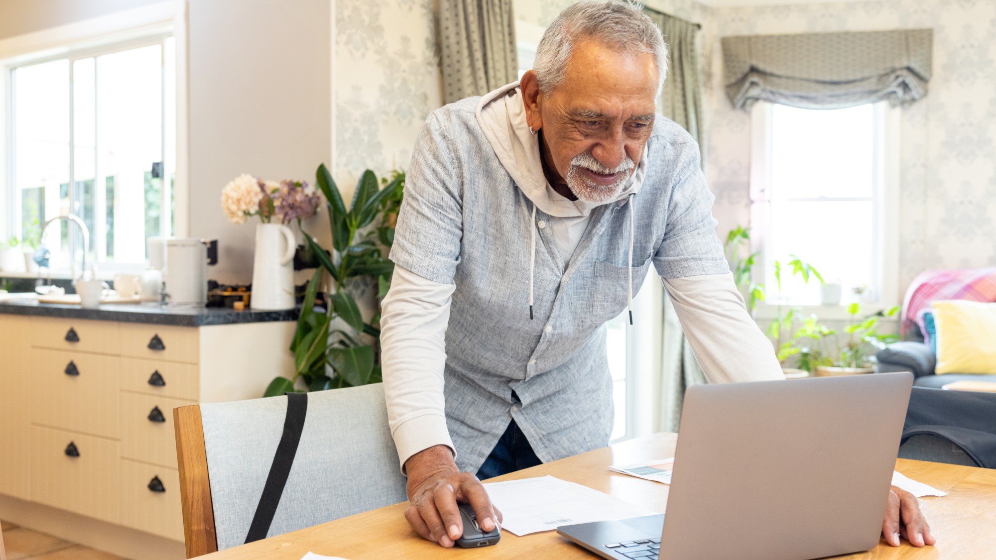 man looking at computer