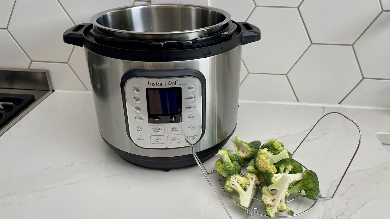 Broccolli which has been steamed in an Instant Pot Duo Nova on a kitchen countertop