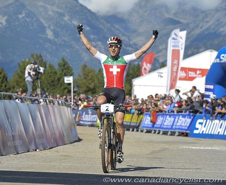Nino Schurter wins the 2015 cross country world championship.