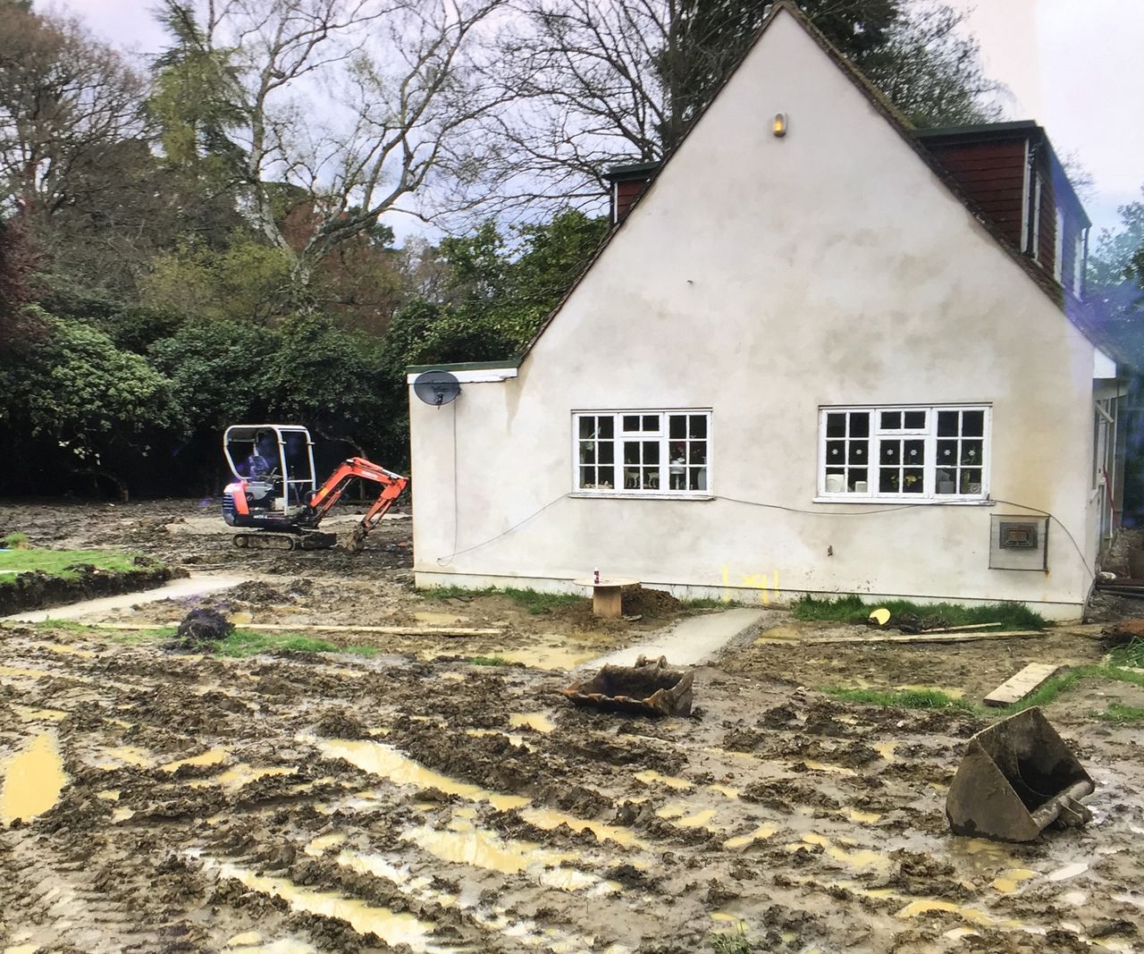 pic of an old pitched roof two-storey house before a renovation