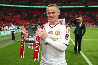 Wayne Rooney celebrates with the FA Cup after Manchester United's win over Crystal Palace in the 2016 final.