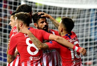 Diego Costa celebrates with team-mates after scoring for Atletico Madrid against Real Madrid in the UEFA Super Cup in August 2018.