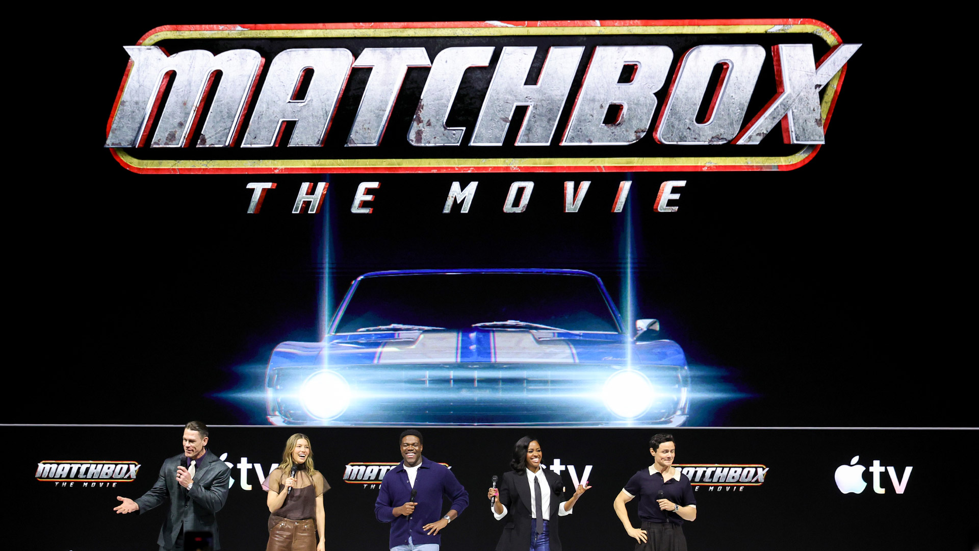 The cast of Matchbox The Movie on stage at an Apple TV press event