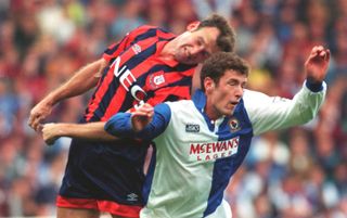 CHRIS SUTTON OF BLACKBURN ROVERS SOCCER CLUB IS CHALLENGED BY DAVE WATSON OF EVERTON DURING THEIR FA CARLING PREMIER LEAGUE MATCH AT BLACKBURN.