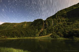 Short star trails circle the North Star, Polaris, above a gorgeous landscape on Flores Island in this long-exposure image by astrophotographer Sérgio Conceição. He called this scene a "rare moment" for the Indonesian island, where the sky is seldom clear enough to capture such a spectacular view of the sky.