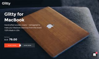 This stunning handcrafted wooden cover is a striking high-end gift for any designer with a MacBook