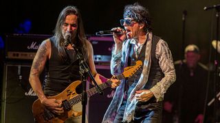 Extreme's Nuno Bettencourt and Gary Cherone onstage. Bettencourt says Cherone has never sounded better than on Six.